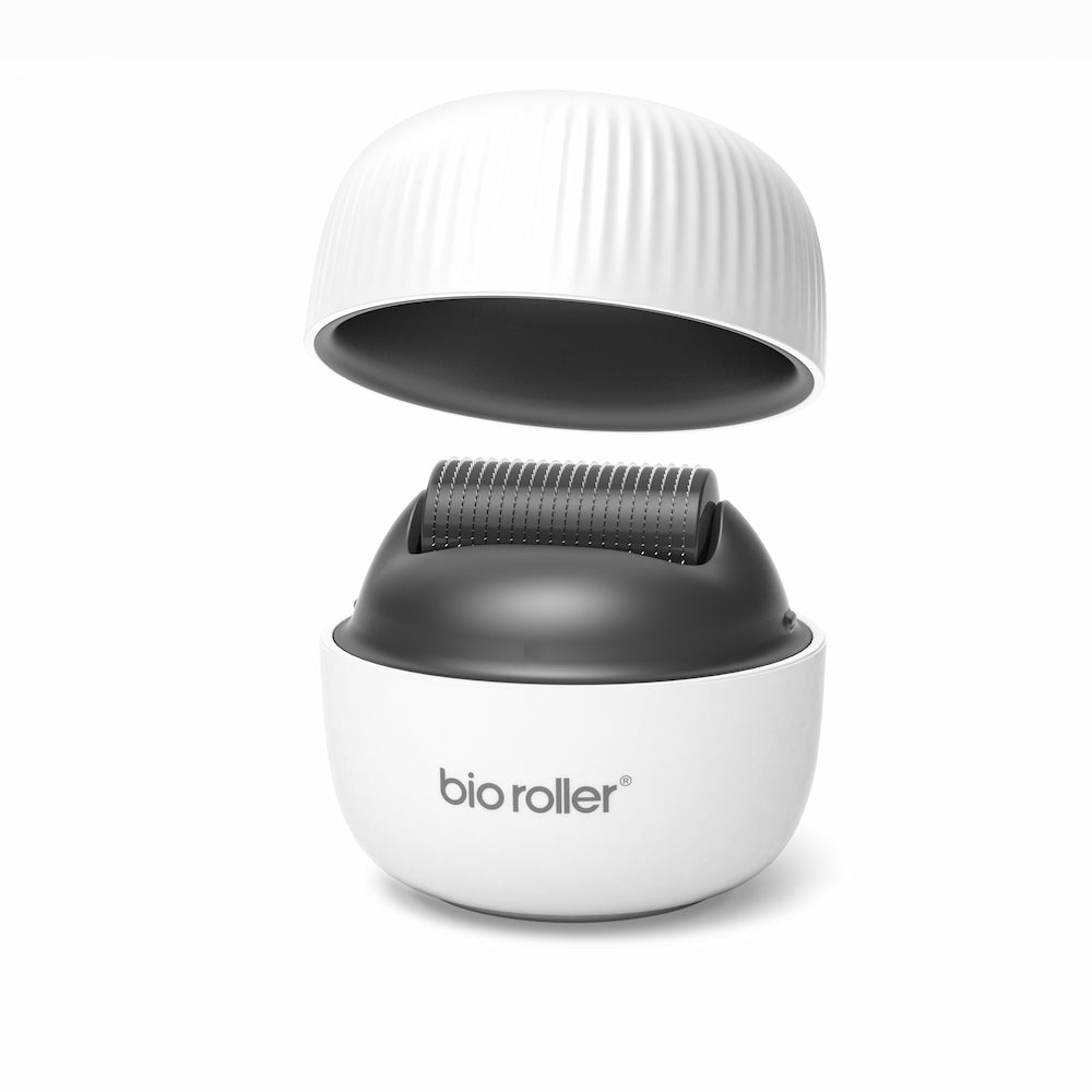 Bio Roller G4 microneedling-roller with protective cap open, showing the needle head used for skin rejuvenation and improved product absorption.
