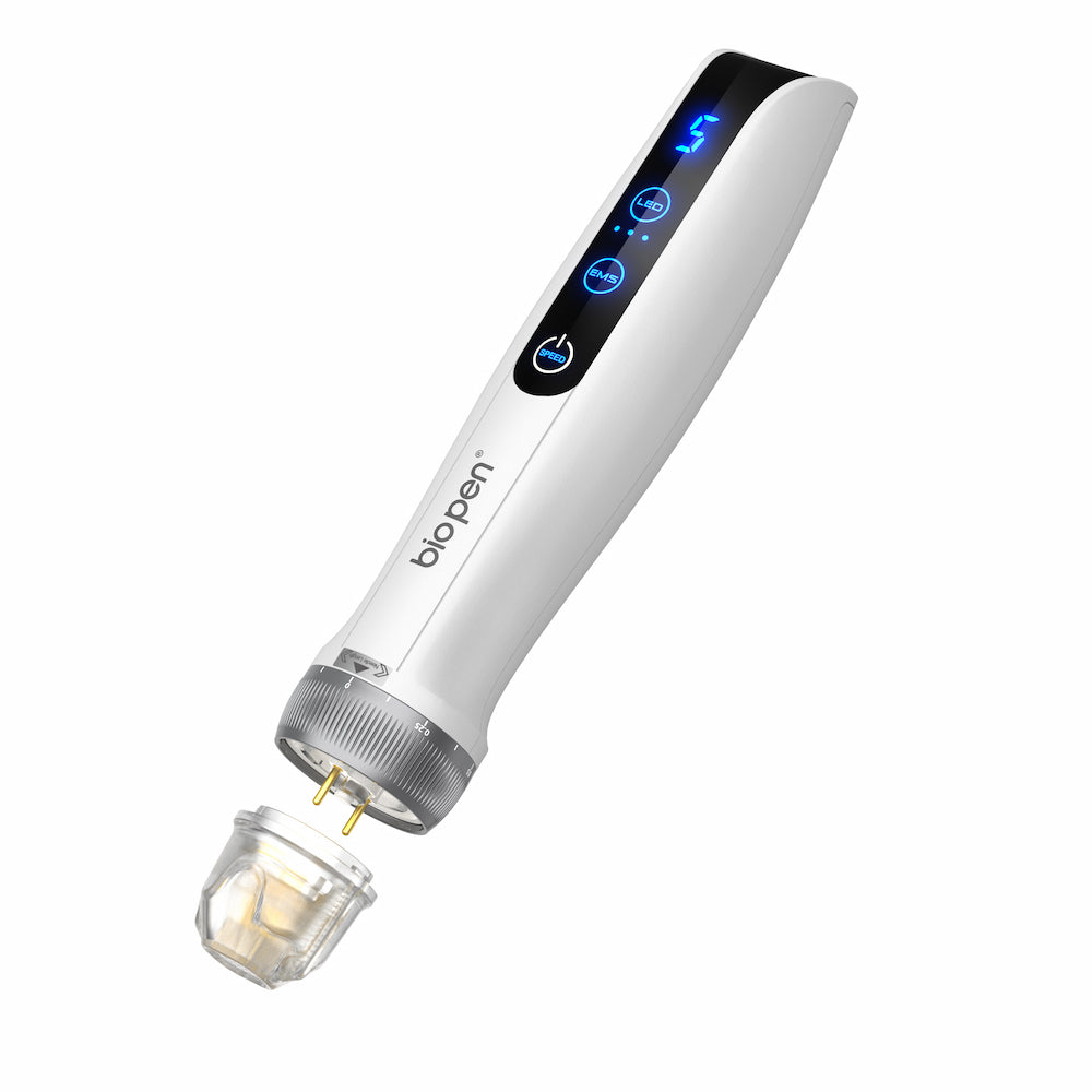 Bio pen Q2 microneedling pen in white with blue LED display, shown with a detached needle cartridge where the two contact pins are visible.