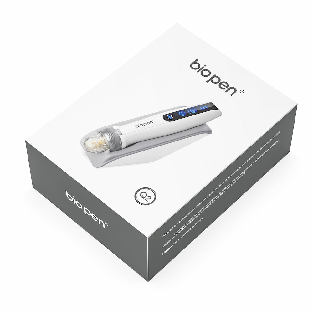 Biopen Q2 microneedling pen shown on the top of a white and gray product box with a clear logo and picture of the pen on the lid.