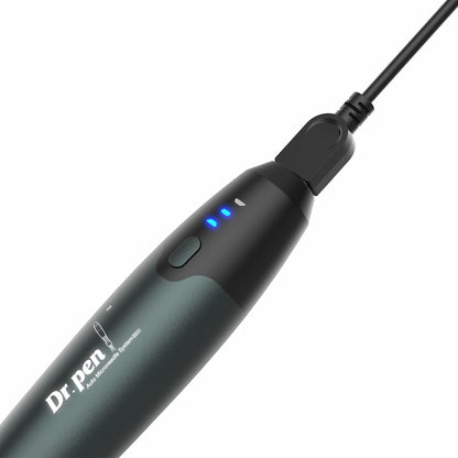 Dr. Pen A20 microneedling-pen charged via USB, with blue battery indicator and ergonomic design for professional skin treatment.