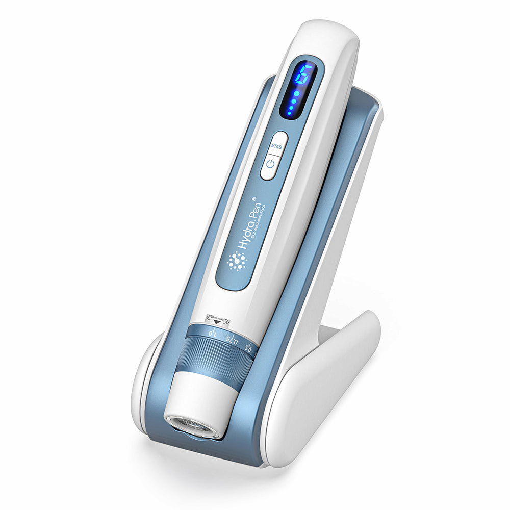 HydraPen H5 white and blue microneedling pen standing in its charging stand, advanced microneedling device for serum infusion and skin treatment.