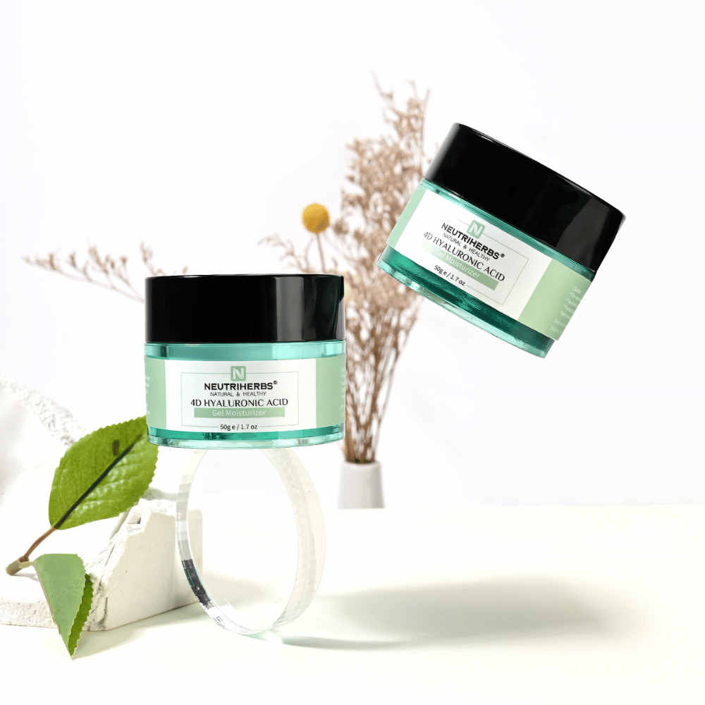 Lifestyle image of Neutriherbs 4D Hyaluronic Acid Gel Moisturizer 50 g. Two jars of the hydrating gel cream are presented in a bright and stylish setting with natural details that convey a fresh skincare routine and intense hydration.
