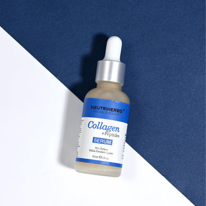 Neutriherbs Collagen + Peptides Serum 30 ml against a stylish blue and white background. A hydrating facial serum with peptides and collagen that contributes to firmer skin, improved elasticity, and a smoother skin texture.