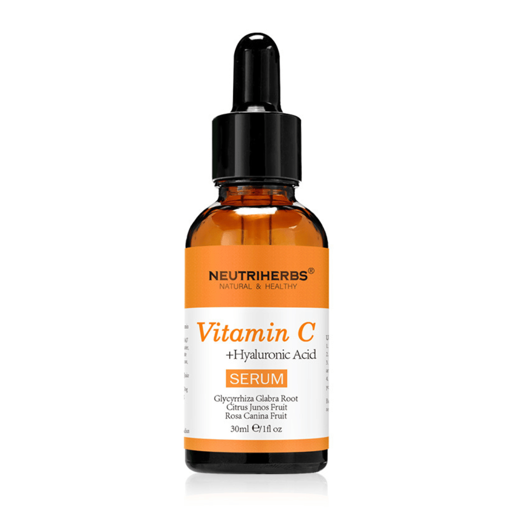 Neutriherbs Vitamin C + Hyaluronic Acid Serum 30 ml against a white background. Facial serum with vitamin C and hyaluronic acid that hydrates the skin, boosts radiance, and contributes to a more even skin tone.