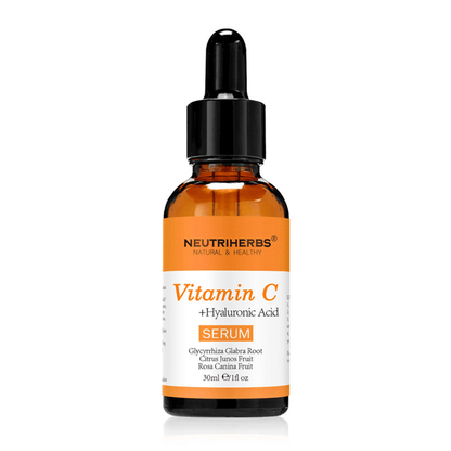 Neutriherbs Vitamin C + Hyaluronic Acid Serum 30 ml against a white background. Facial serum with vitamin C and hyaluronic acid that hydrates the skin, boosts radiance, and contributes to a more even skin tone.