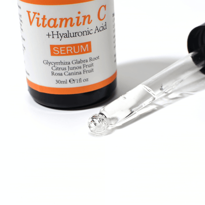 Close-up of a dropper and bottle of Neutriherbs Vitamin C + Hyaluronic Acid Serum 30 ml. The lightweight serum texture absorbs quickly and hydrates the skin while contributing to enhanced radiance and a more even skin tone.